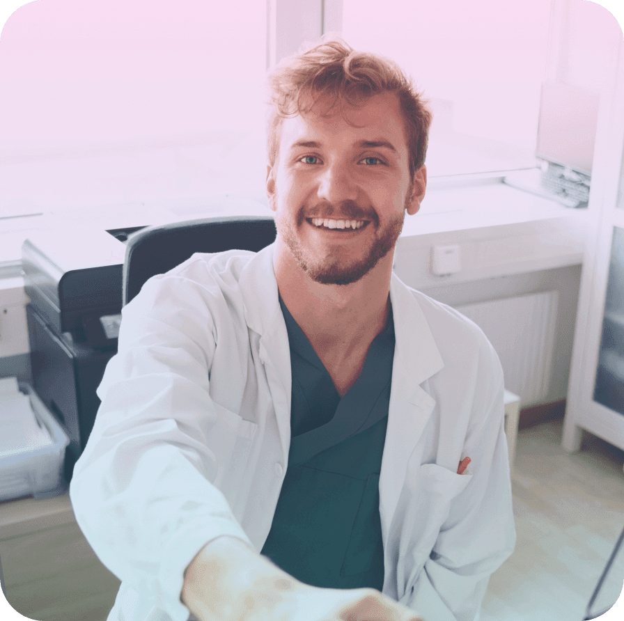 Smiling doctor sitting in the office