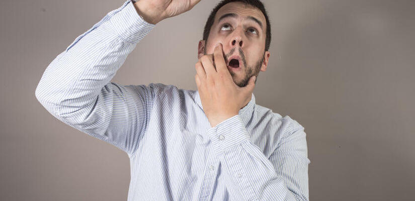 Man Throws Needle Through Glass